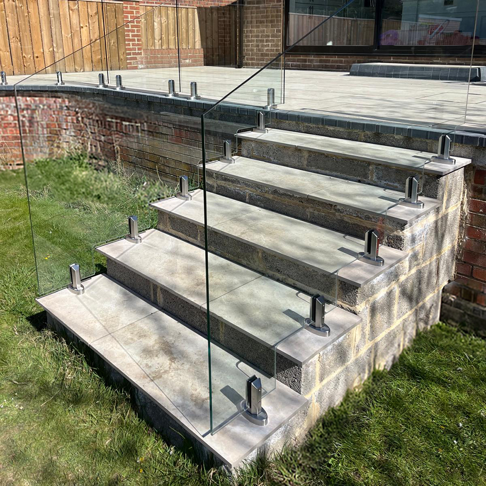 Modern balcony with glass spigot system